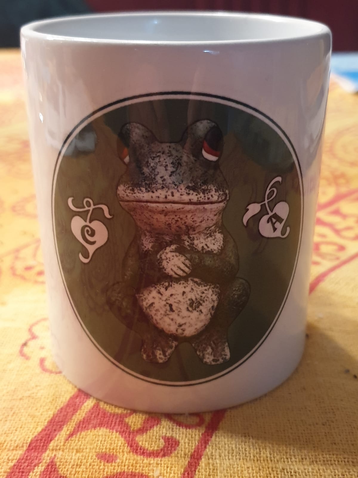 Glückliche Zeilen Tasse mit dem Frosch